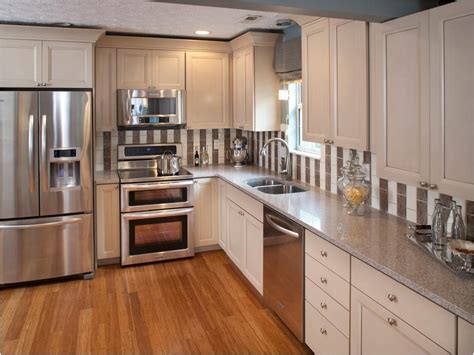 antique white kitchen cabinets with stainless steel appliances|mixing white and stainless appliances.